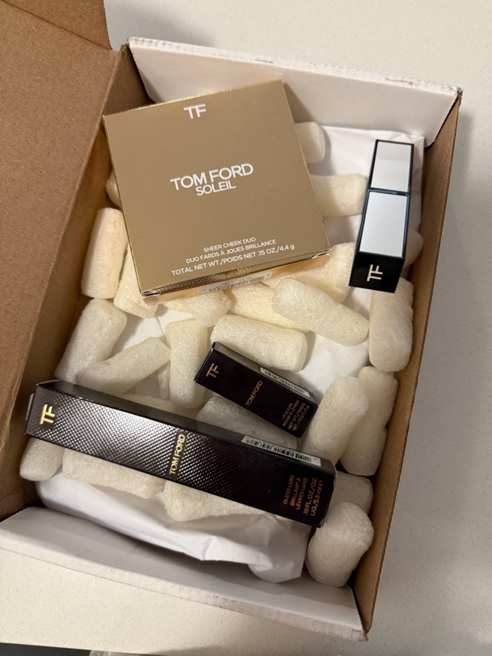 Tom Ford Makeup Set in Gold and Black Packaging